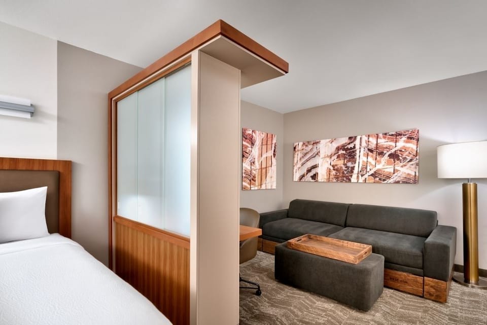Enjoy an open studio feel with cozy seating and lighting.