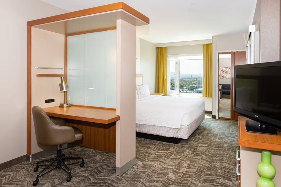 Wake up refreshed in a bright suite with skyline views.