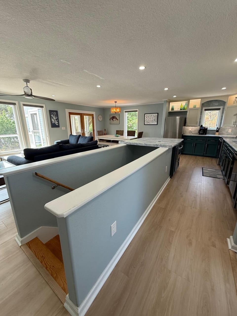 Living room, kitchen, and dining area