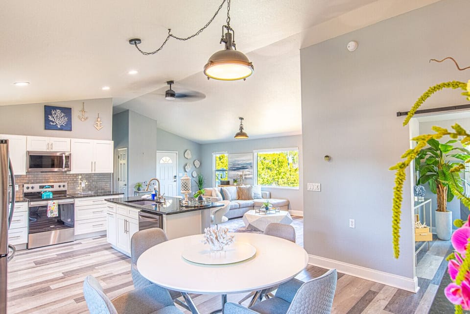 Dining area overlooking kitchen & living area