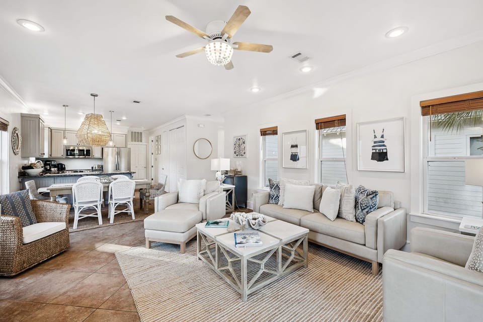 Unwind in your bright, open living space with coastal charm and comfortable seating for the whole family.