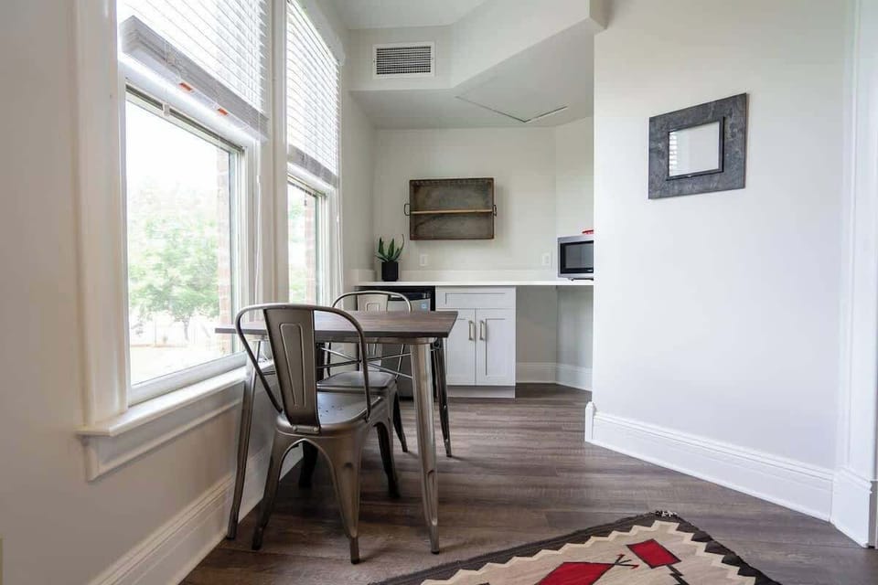 The room has its own dining seat, microwave and mini fridge.