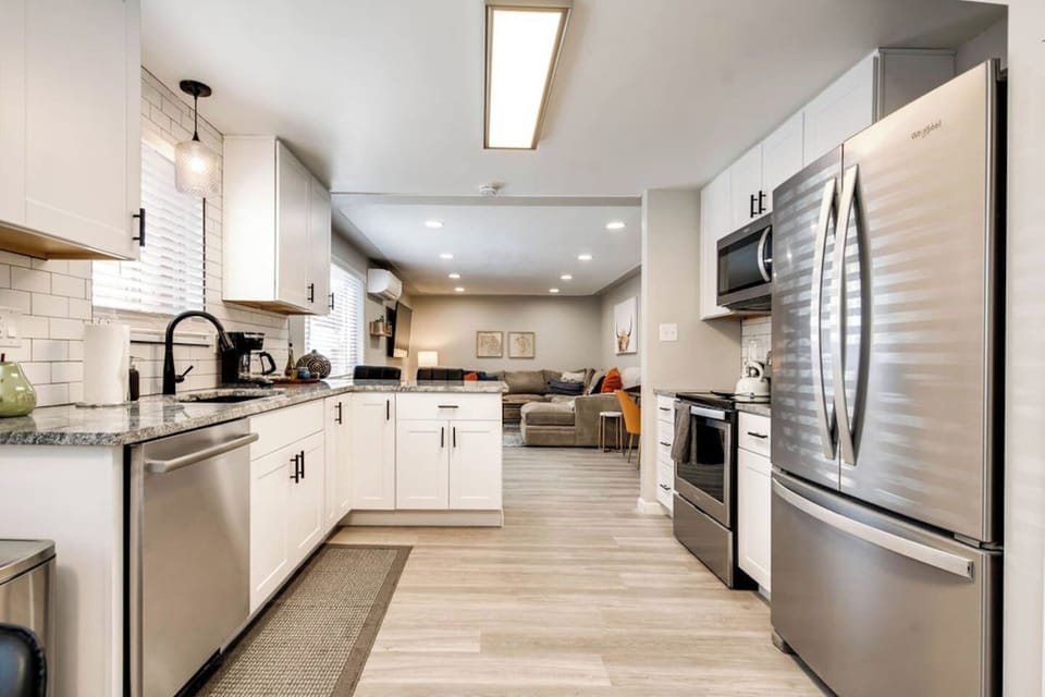 Newly remodeled kitchen with stainless steel appliances and fully stocked with all your cooking needs