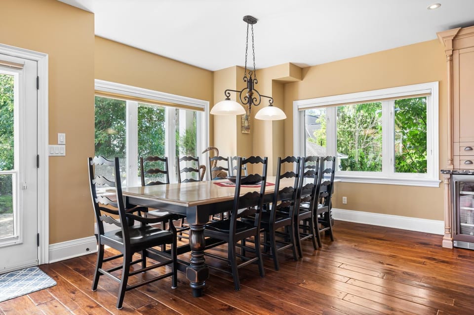 Sunlit dining room with seating for large gatherings