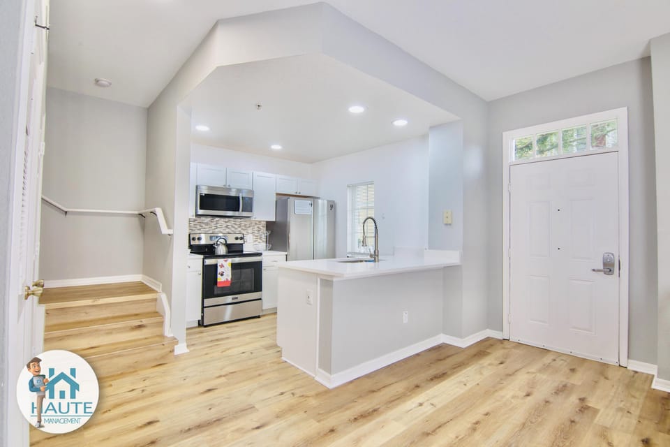 Modern entryway and kitchen interior