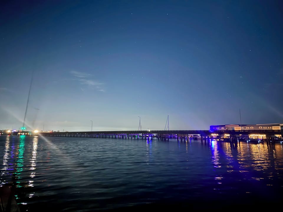 Cortez Bridge and marina at night over the Bay