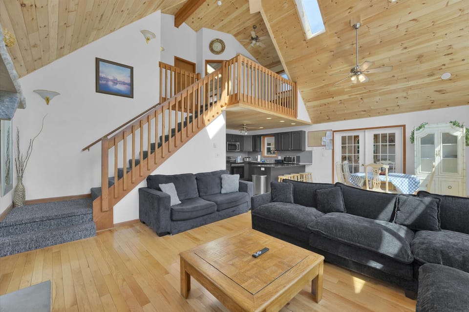 Grand Open Living Space with Loft View