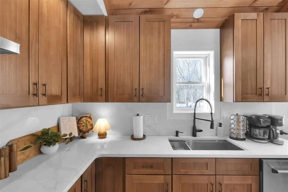 Fully Equipped Kitchen with Custom Wood Cabinets