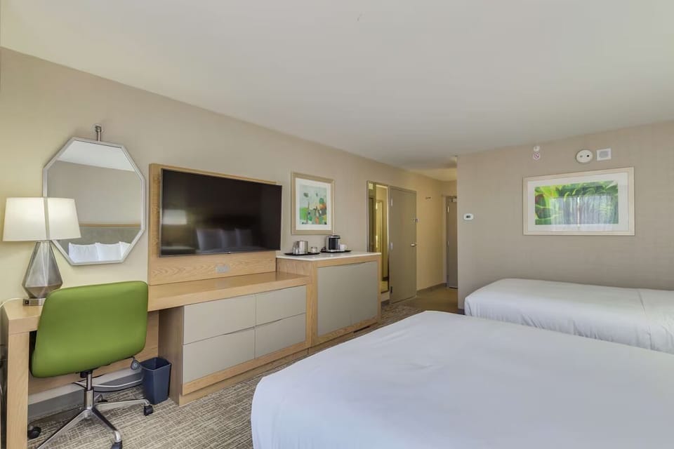 Settle in with a handy workspace and cozy second bed.