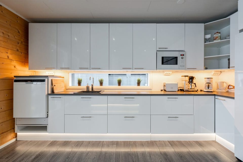 Our modern kitchen layout is designed for socializing, ensuring the chef is always part of the conversation.