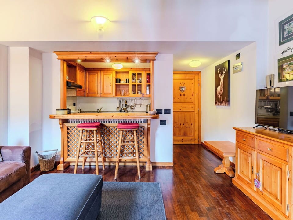 Furniture, Interior Design, Flooring, Wood, Floor, Ceiling, Room, Table, Wood Flooring, Lighting