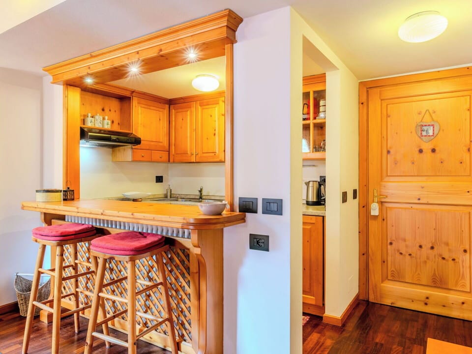 Wood, Interior Design, Flooring, Furniture, Ceiling, Floor, Cabinetry, Wood Stain, Room, Hardwood