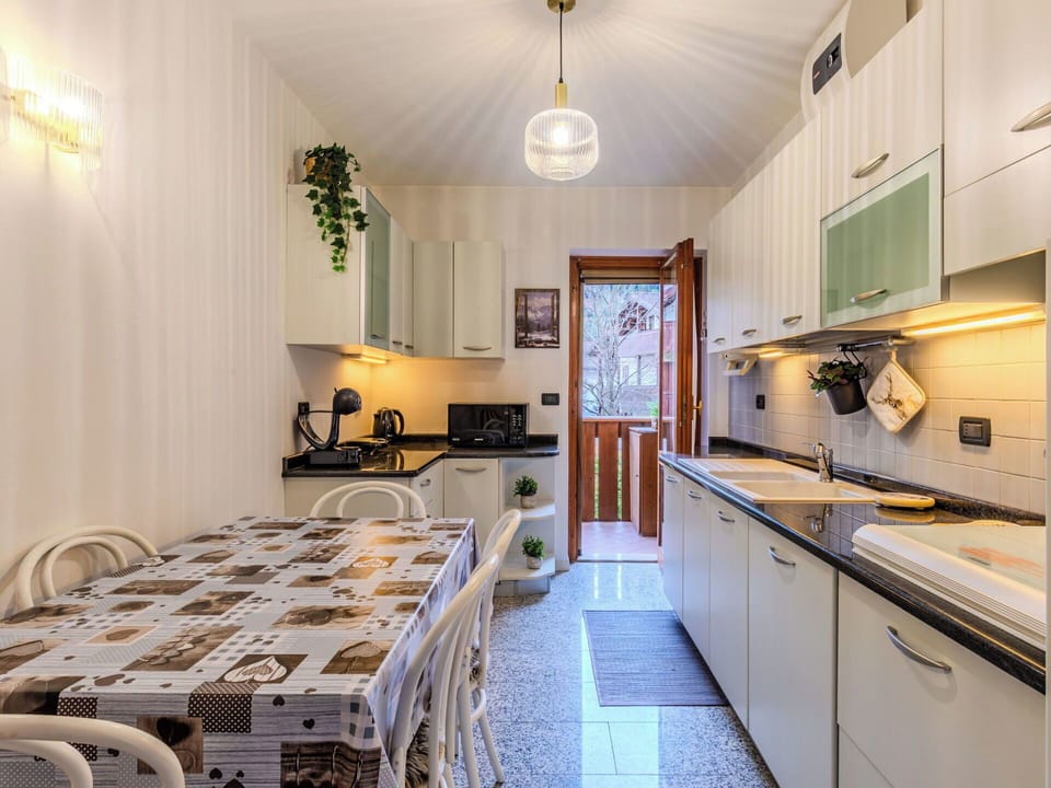 Interior Design, Wood, Flooring, Kitchen, Ceiling, Major Appliance, Floor, Kitchen Appliance, Lighting, Furniture
