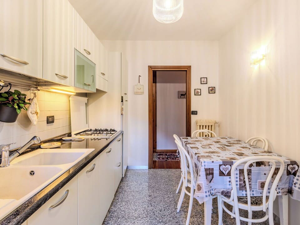 Interior Design, Flooring, Wood, Floor, Ceiling, Room, Kitchen, Lighting, Furniture, Countertop