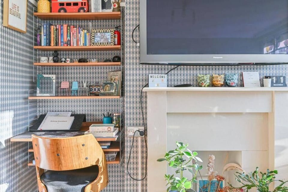 Home Office: Stylish workspace with vibrant decor and views—perfect for productivity and inspiration!
