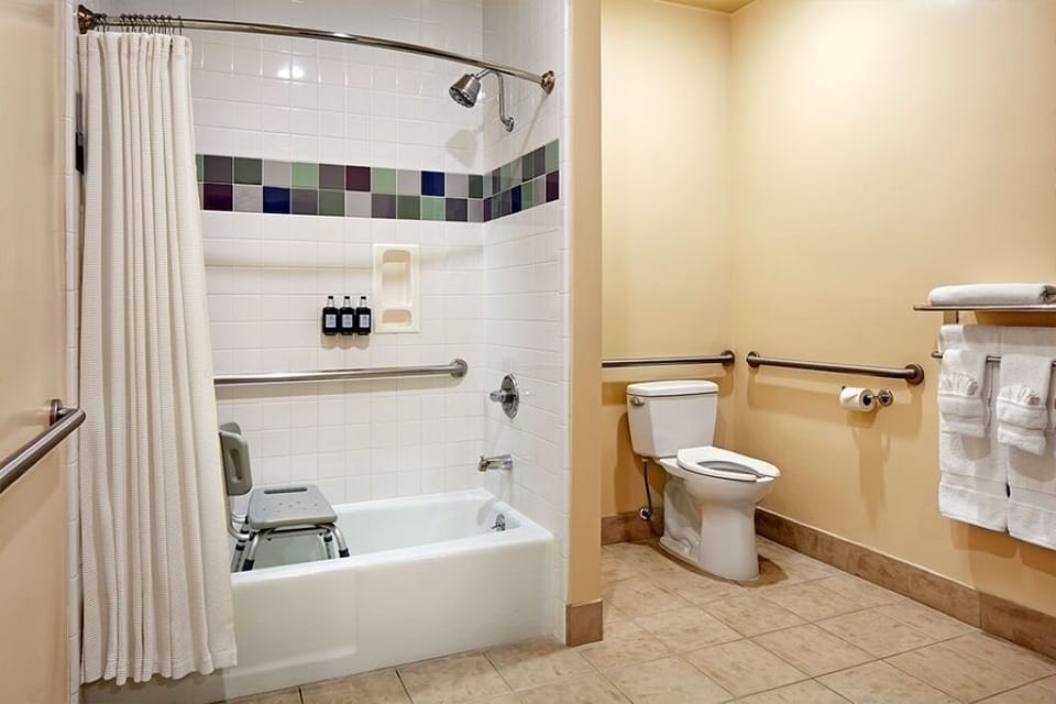 Enjoy extra space and comfort in the accessible bathroom layout.