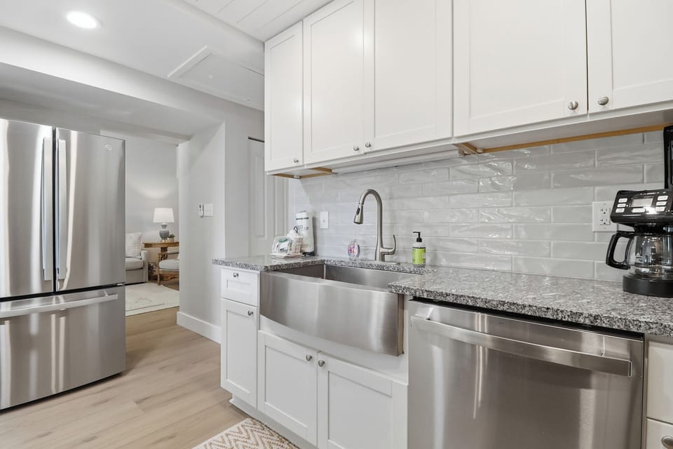 Fully equipped kitchen with new refrigerator and dishwasher