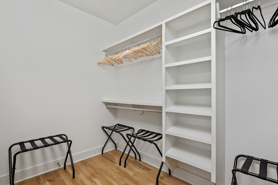Experience stylish Nashville luxury with ample storage and chic design. Perfect for large groups or families, unwind in this organized closet after a night out in Music City.