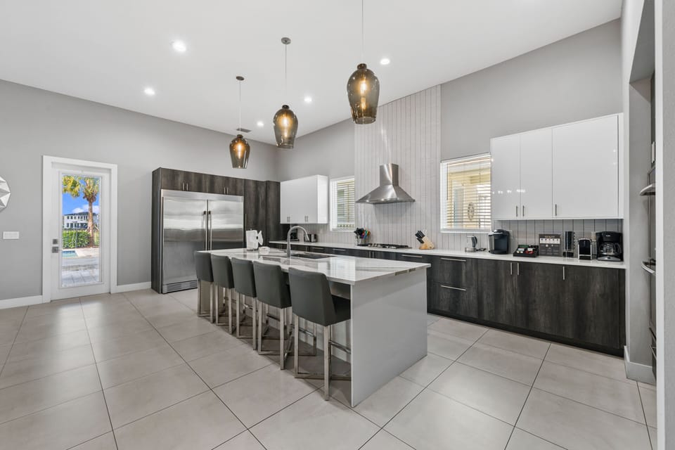 The breakfast bar has seating for up to 5 guests