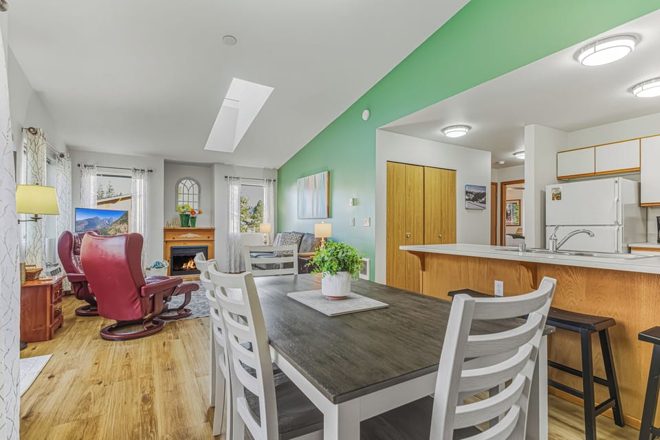 Open and inviting dining room, living room and kitchen.