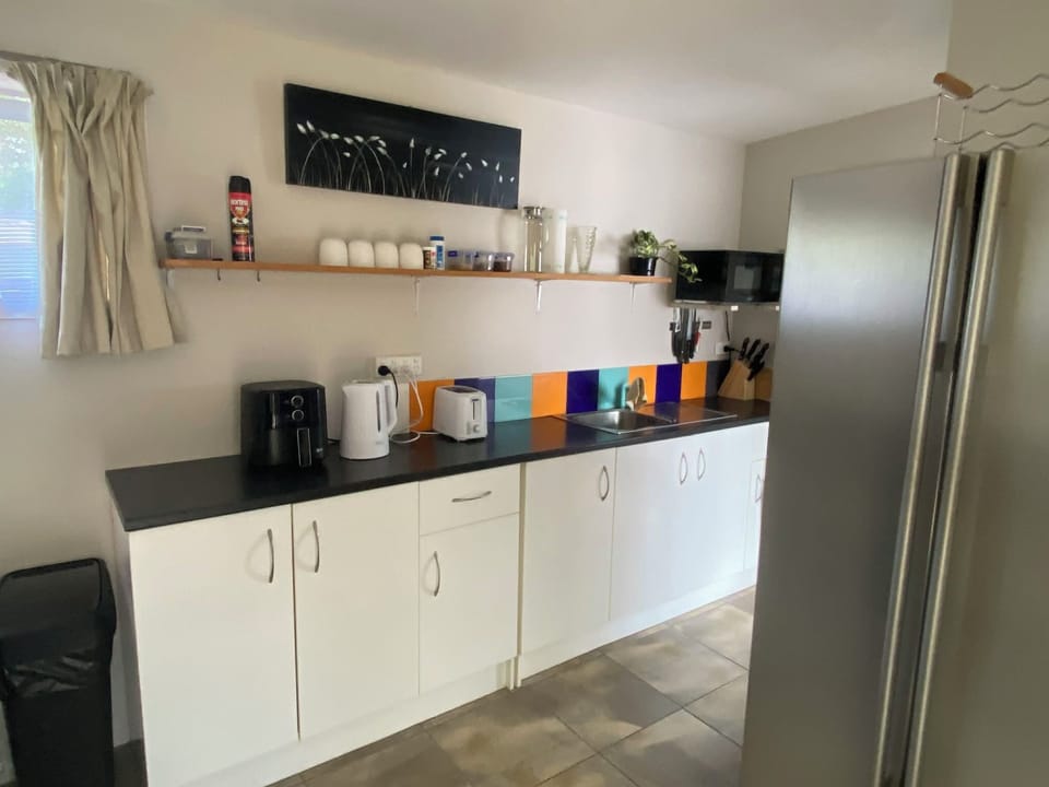 Kitchenette, fridge freezer, small air fryer, microwave,