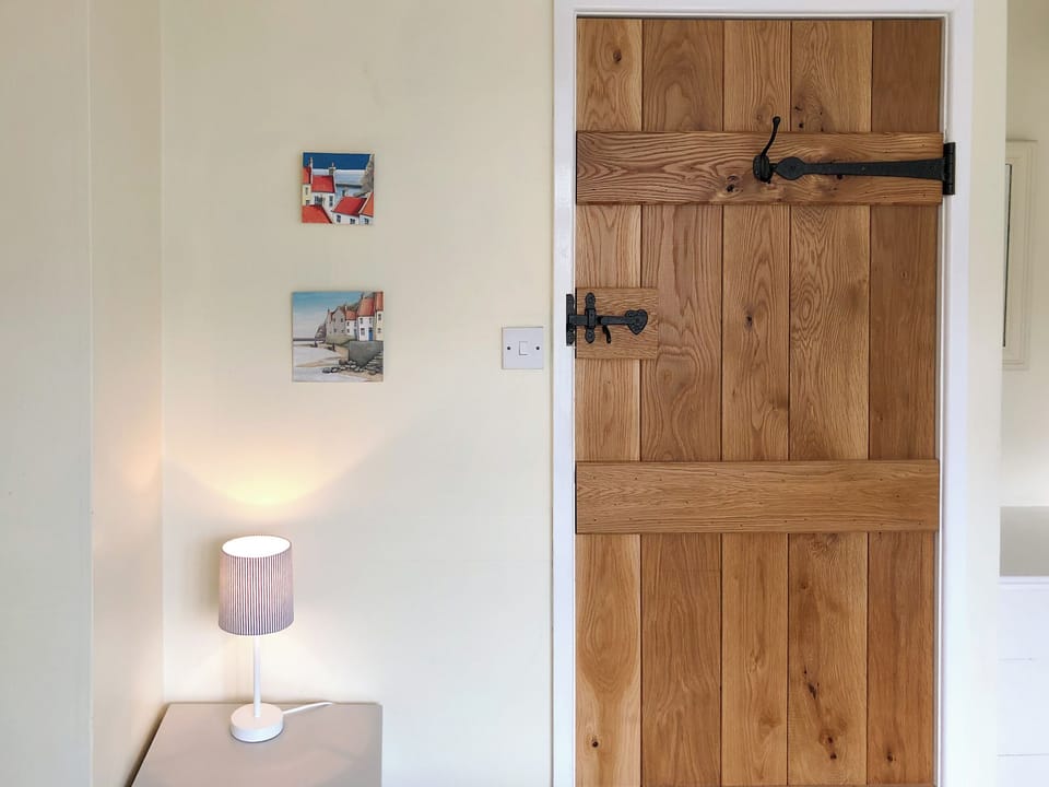 Cosy bedroom with double bed and an additional single | The Anchorage, Staithes, near Whitby