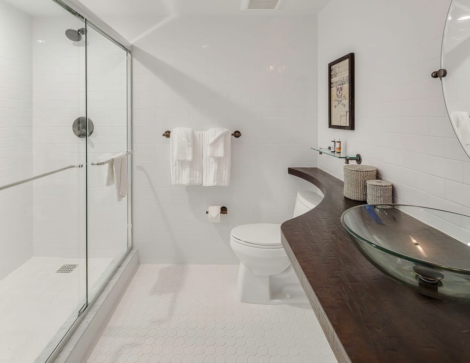 Refresh easily in a spotless walk-in shower after beach days.