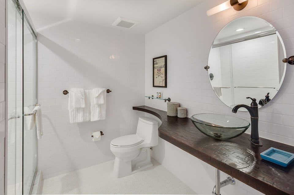 Start your morning with a sleek vanity and bright lighting.
