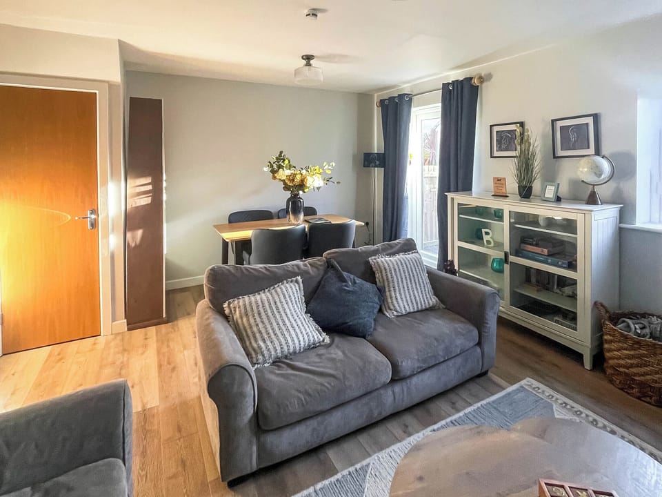 Comfortable sitting room with dining area | Hilly Brow, Beadnell