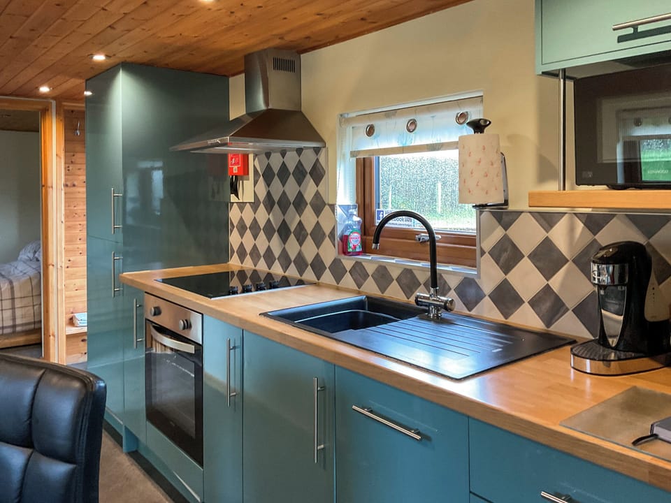 Kitchen/diner | Lovers Lodge, Llandrindod Wells