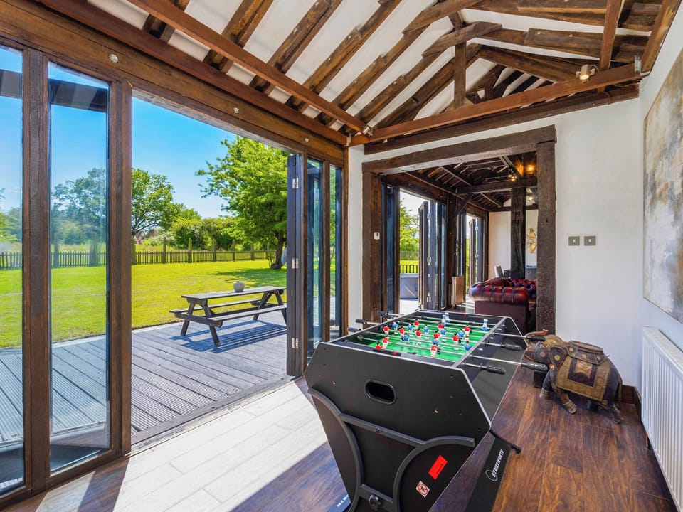 Games room | Essex Barn House - Barn House and Mansion, Romford