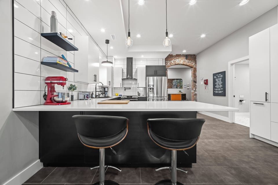 Island bar seating for easy dining and gathering.