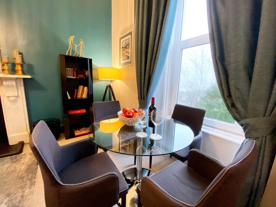 Redcliffe Apartment 2A - dining area in living room.