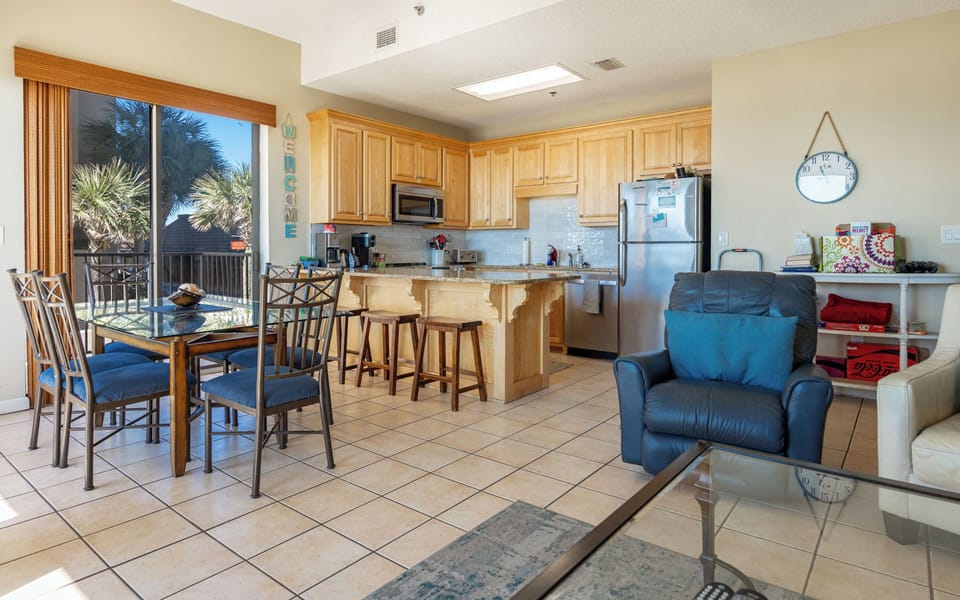 Savor beach vibes while sipping coffee at the dining table, with light pouring in from the large windows