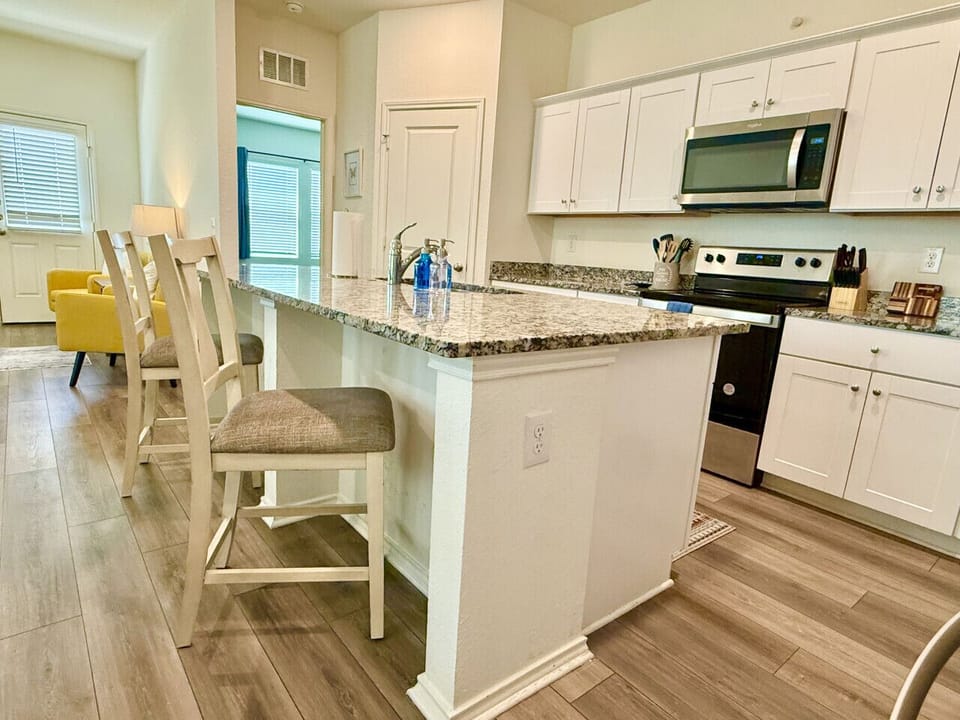 Create unforgettable meals in this beautifully designed, fully equipped kitchen. Gather your group to savor delightful dining experiences in the elegant dining area.