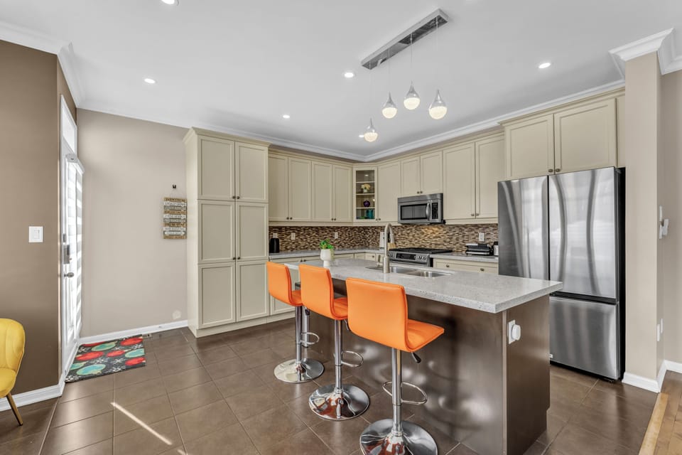 Breakfast bar with vibrant seating