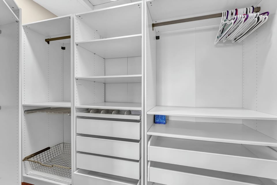 Custom walk-in closet with built-in shelving
