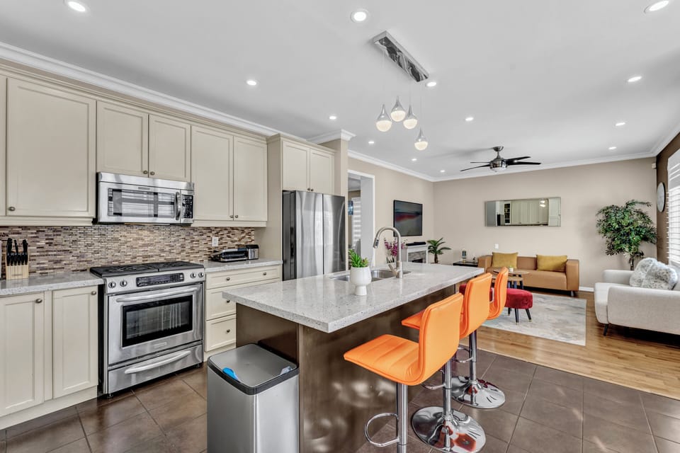 Stainless steel appliances and ample counter space