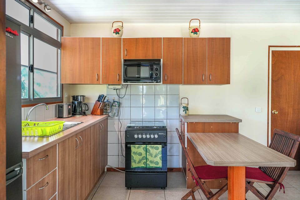 Spacious kitchen layout with dining space