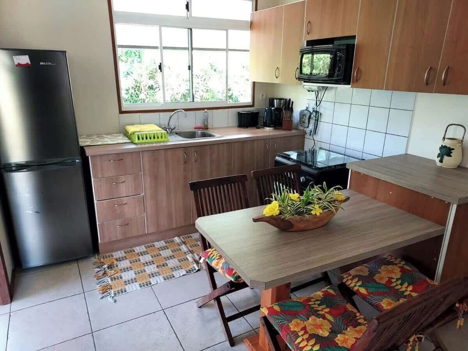 Open kitchen and dining area with modern appliances