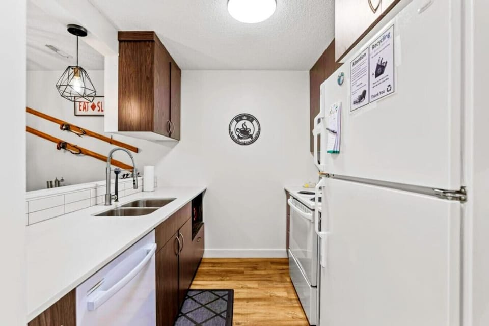 The compact, yet functional kitchen is perfect for hassle-free meal preparation.