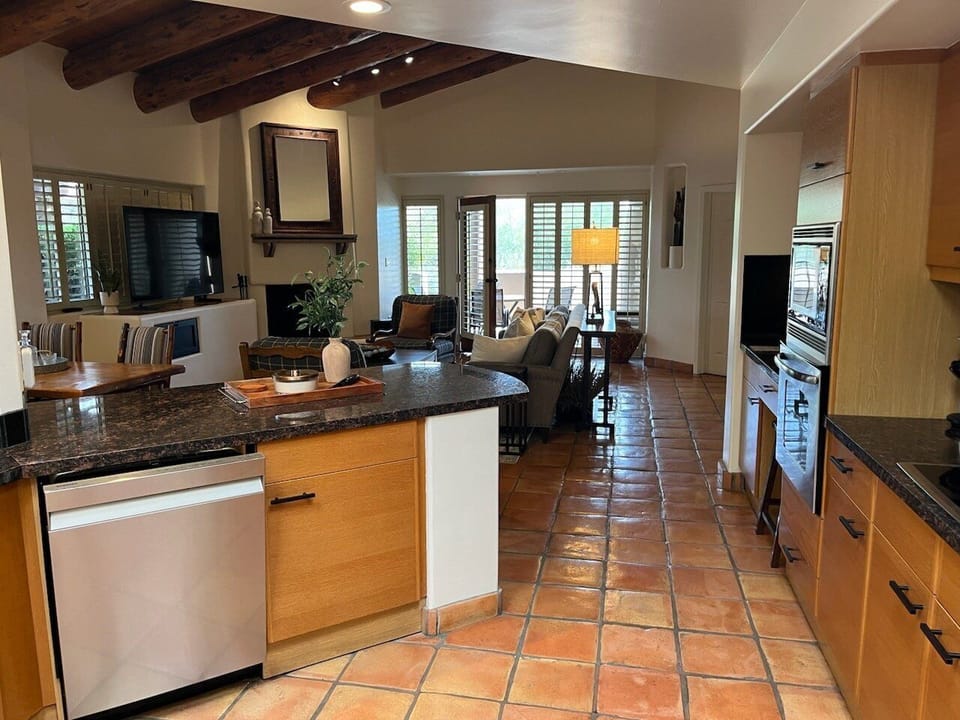Serve snacks, drinks and meals on the counter that opens into the great room.