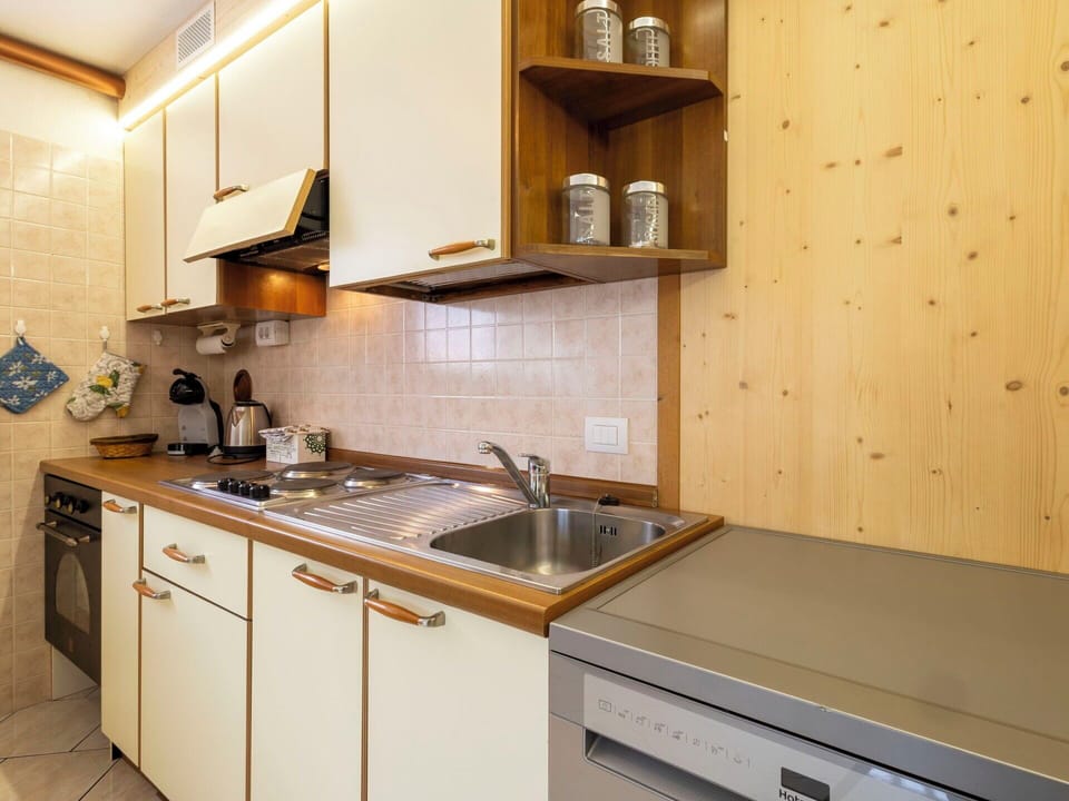 Kitchen Appliance, Kitchen, Countertop, Major Appliance, Cabinetry, Wood, Interior Design, Kitchen Sink, Home Appliance, Kitchen Stove