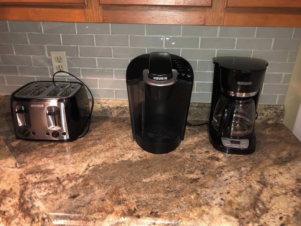 Two kinds of coffee makers for your favorite way of making coffee. Other appliances include toaster, crock pot, hand mixer, and more.  Everything you need!