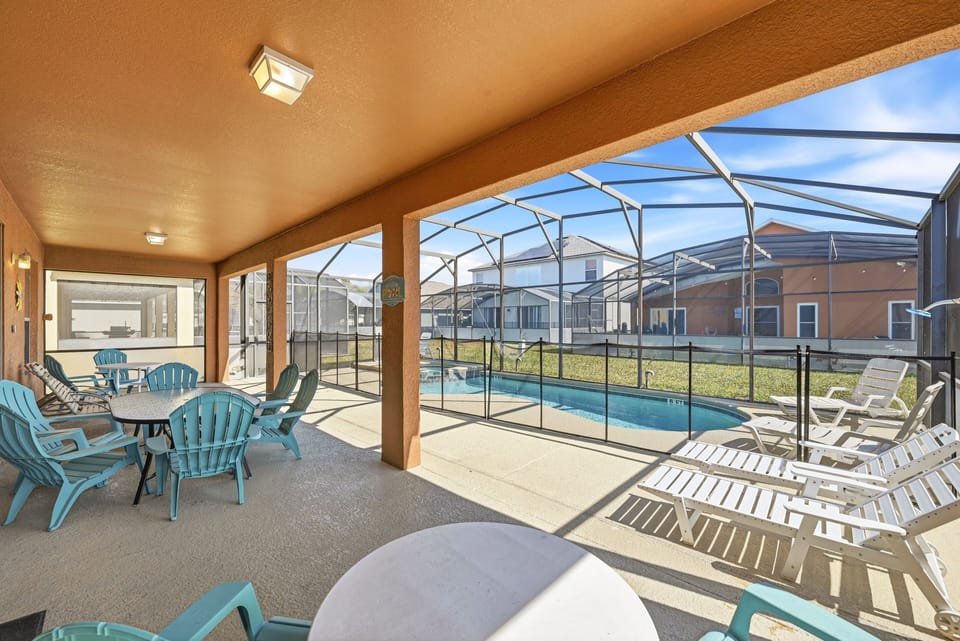 Enjoy your own pool with comfortable outdoor seating and lounge chairs.