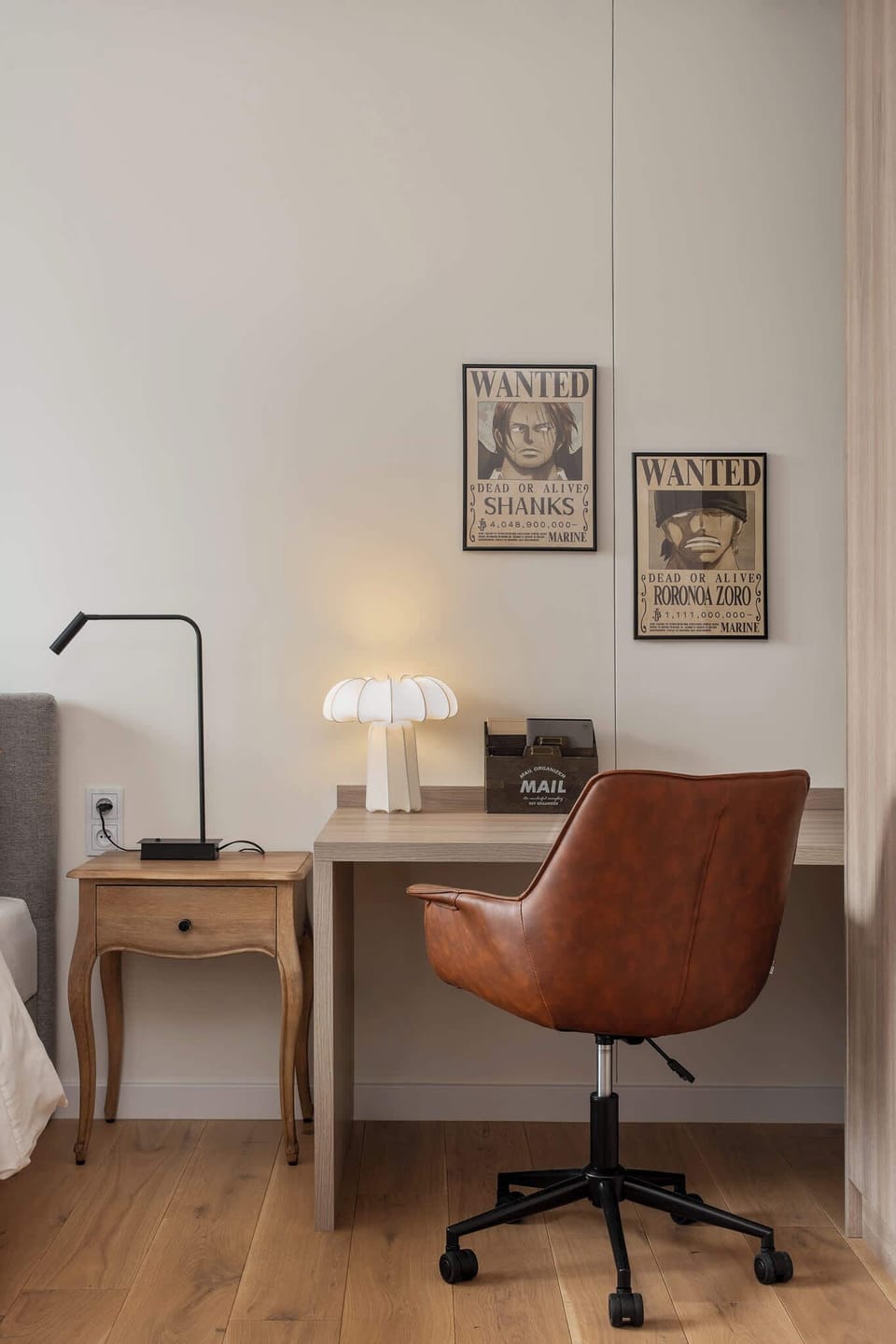 Dedicated workspace with a desk, chair, and soft lighting – ideal for working or studying.