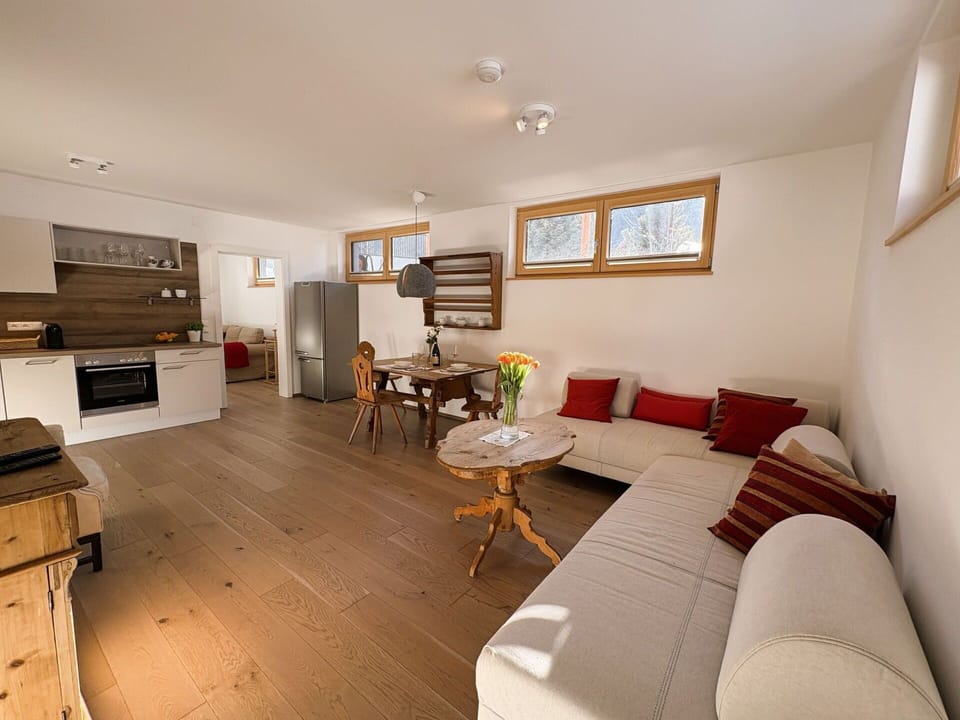 Furniture, Interior Design, Flooring, Wood, Floor, Wood Flooring, Couch, Room, Ceiling, Living Room