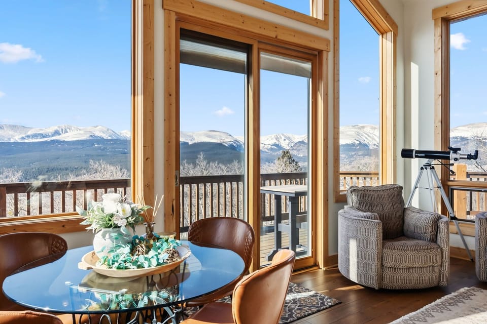 Living room: Gas fireplace (out of order), 50” Smart TV with Roku, large sectional seating and private deck access