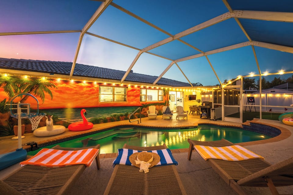 Heated in ground pool with new screened lanai