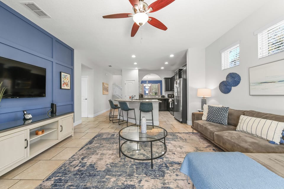 LEISURE ROOM & KITCHEN:  Overview of both Living Room Area and Fully-Equipped Kitchen